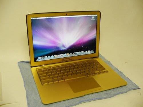 Gold Macbook Air with Bejeweled Rainbow Apple